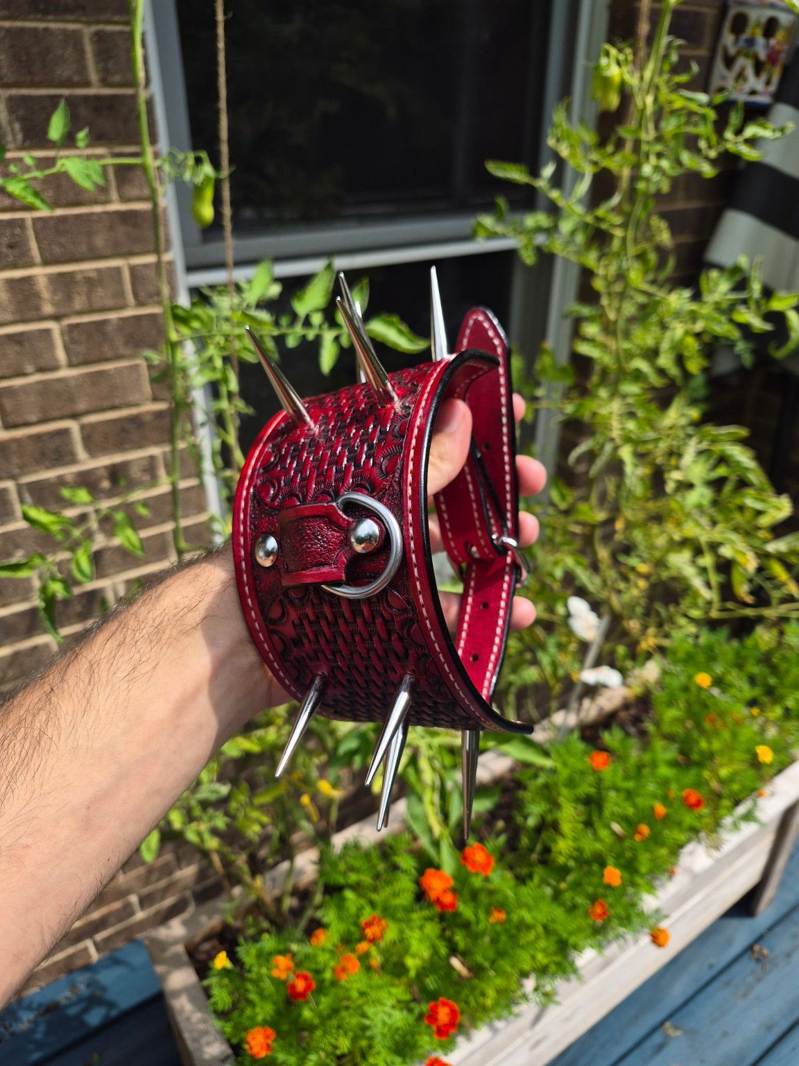 Custom red tooled leather spiked band